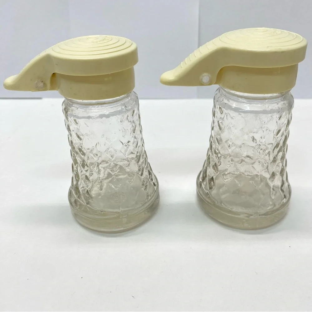 Vintage Daniells Salt and Pepper Shakers Set Beige Top Glass Bottom Plastic Tops